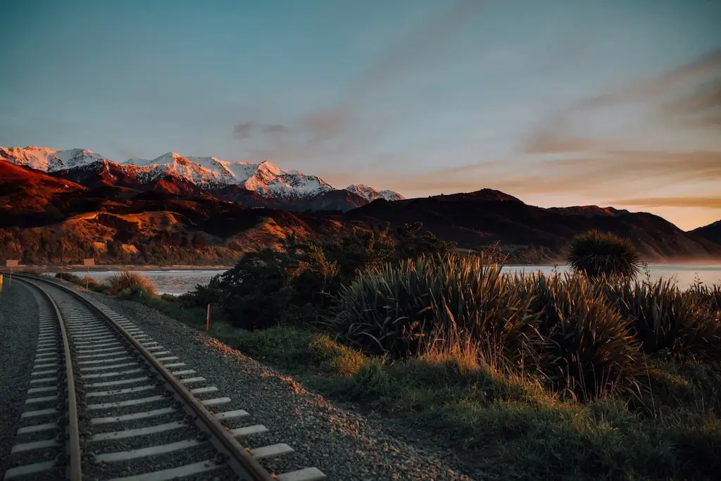 A train line following the coast past Kaikoura, New Zealand.